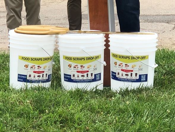 Three buckets of food scraps
