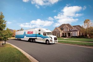 Guardian Relocation Atlas Truck in Front of House