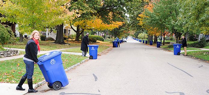 Columbus Neighborhood Resident with Recycling Cans