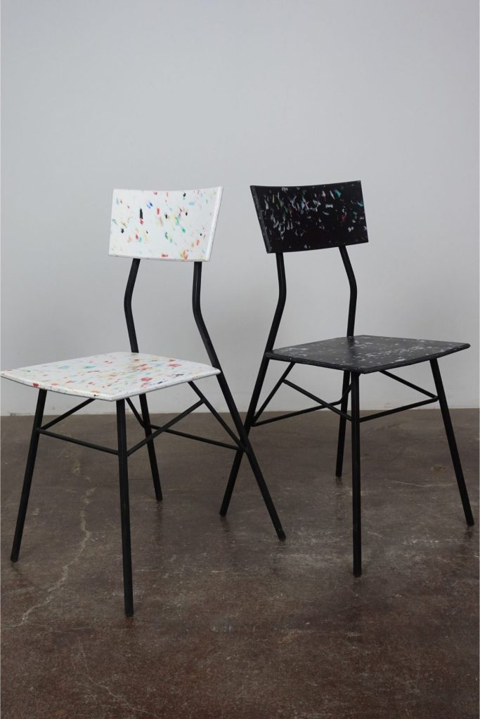 Two chairs made from recycled plastic.