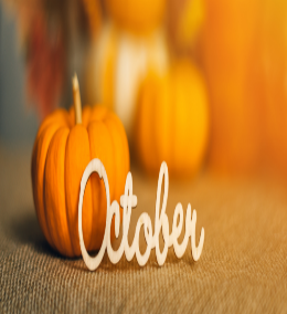 A pumpkin with the word "October" in front of it.