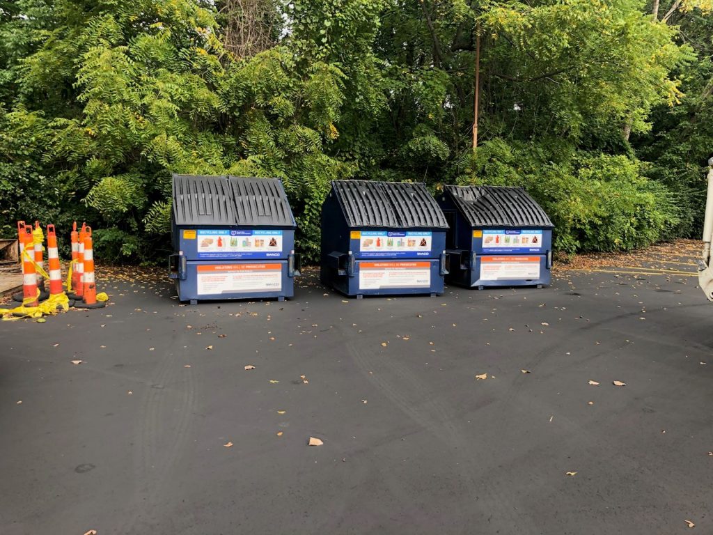 Three dumpsters