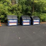 Three dumpsters