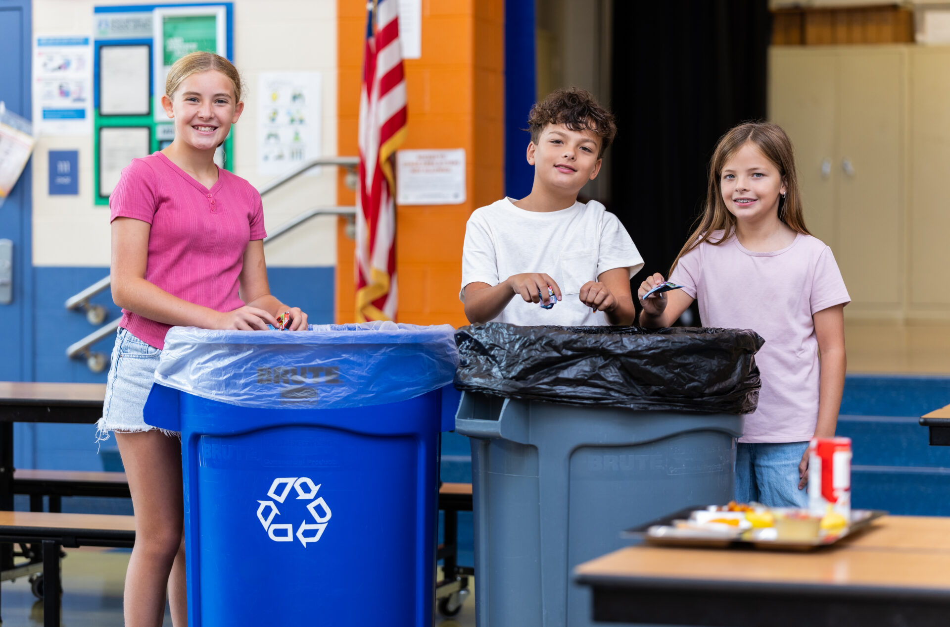 Children_Smiling_While_Sorting_Trash