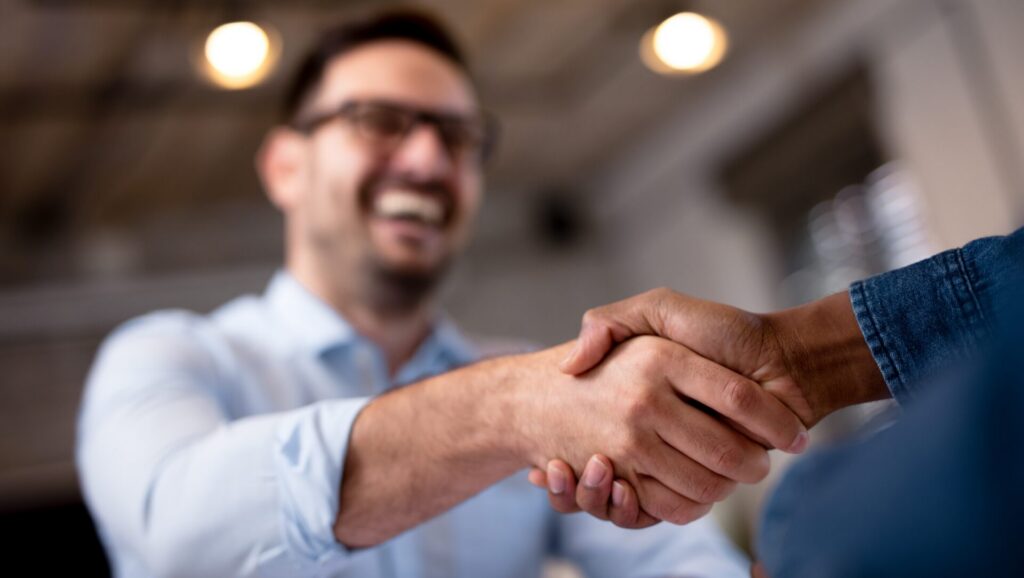 Business people shaking hands