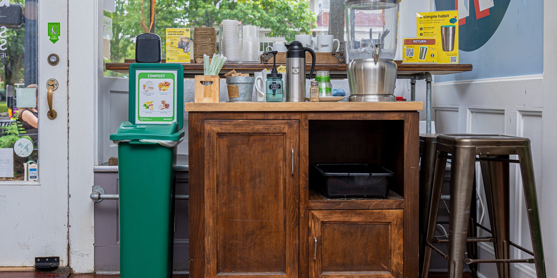 Business Coffee Bar with Signage and recycling materials